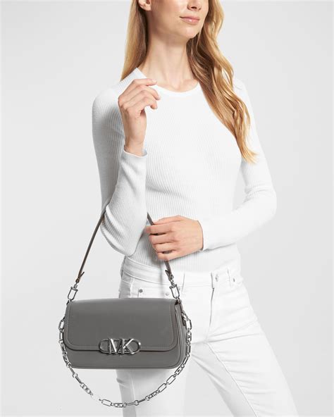 michael michael kors logo parker convertible pouchette shoulder bag|Michael Kors parker bag.